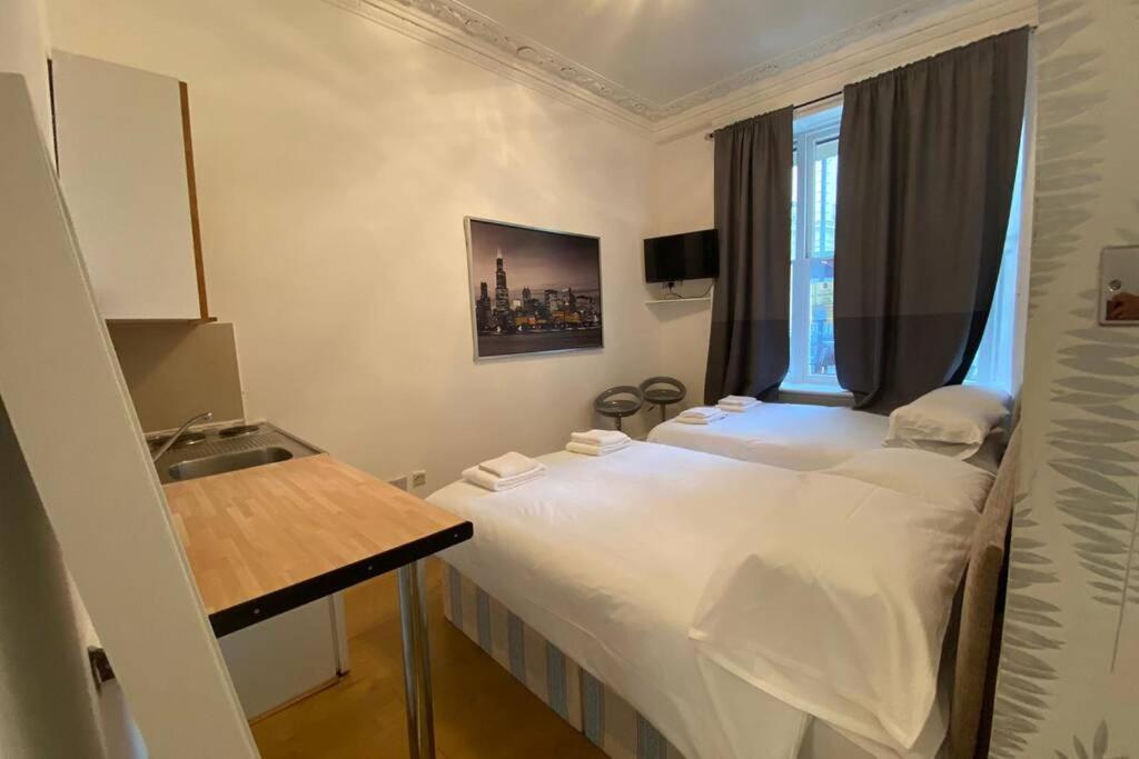 Apartamento F6-comfy Ground Flr Fits 4- Near Paddington Londres