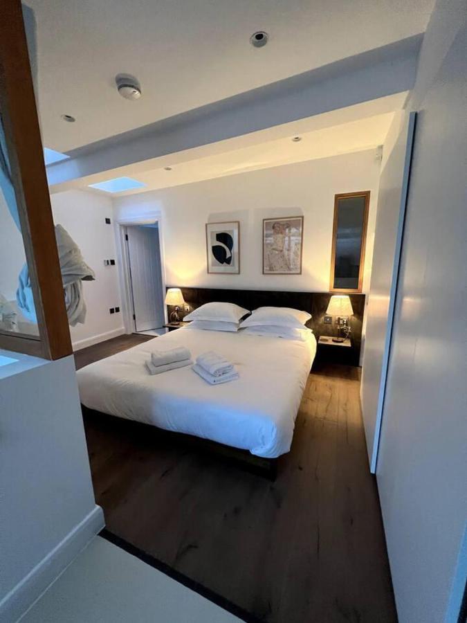 Design Led 1 Bed In Cosmopolitan Queens Park Londres