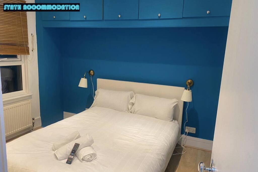 80s Retro 3 Bedroom In Wimbledon Sleeps 6! Netflix Wifi And Arcade! Perfect For Families Business & Leisure Guests! Londres