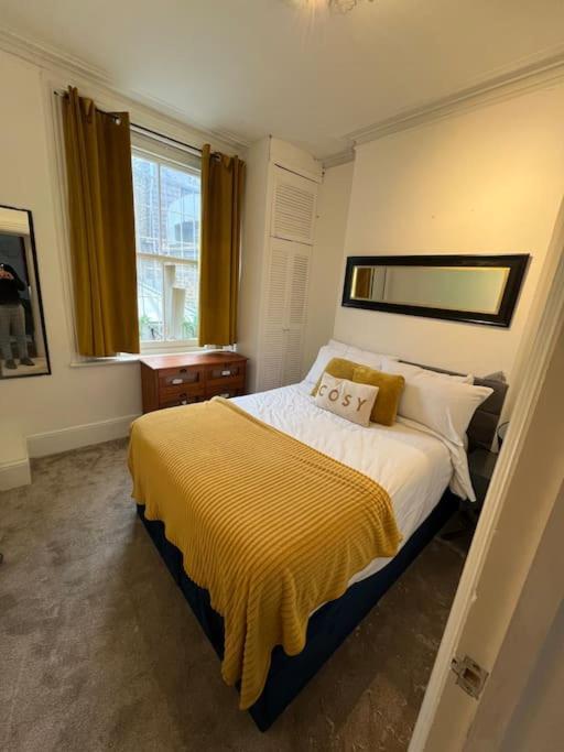 Central London Apartment Apartamento *