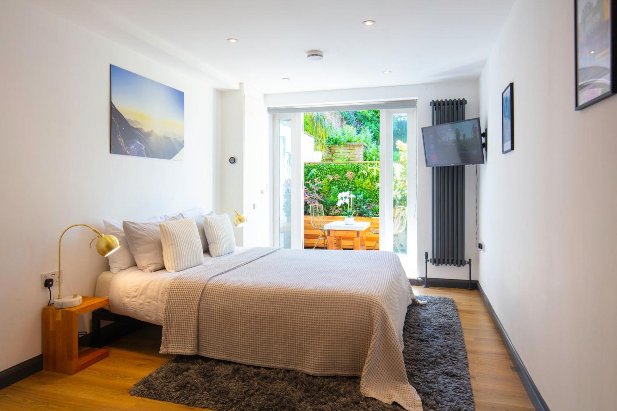 Hidden Retreat With Steam Room, King Bed Near Tube * Londres