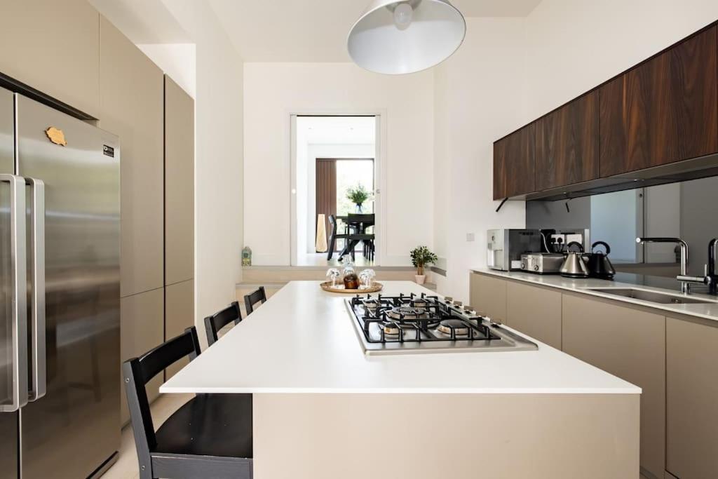 Сasa de vacaciones Modern 3 Bedroom Townhouse By Wild Roses *