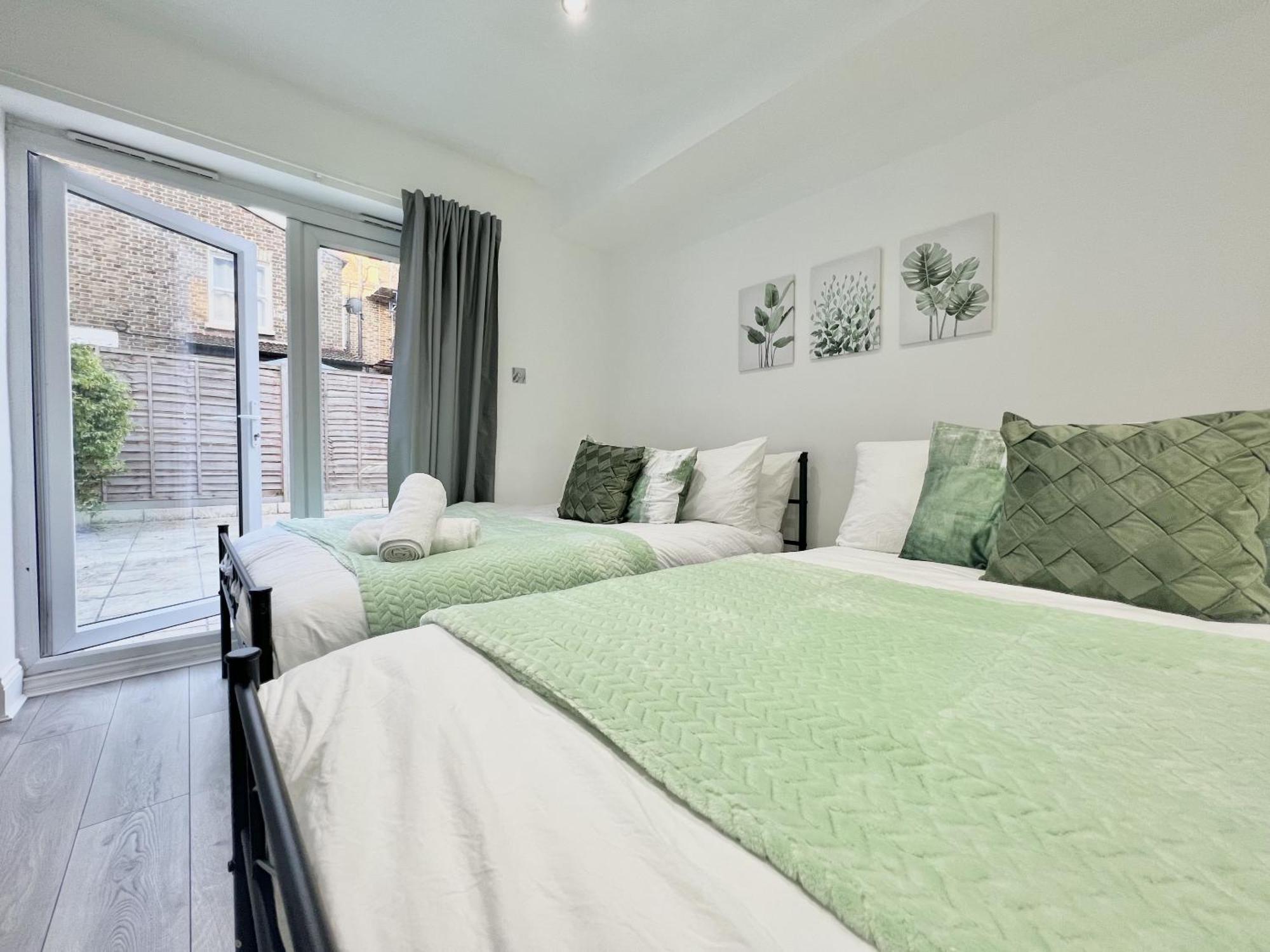 Casa de Férias Charming 3-bed Flat In Shepherds Bush - Sleeps 9