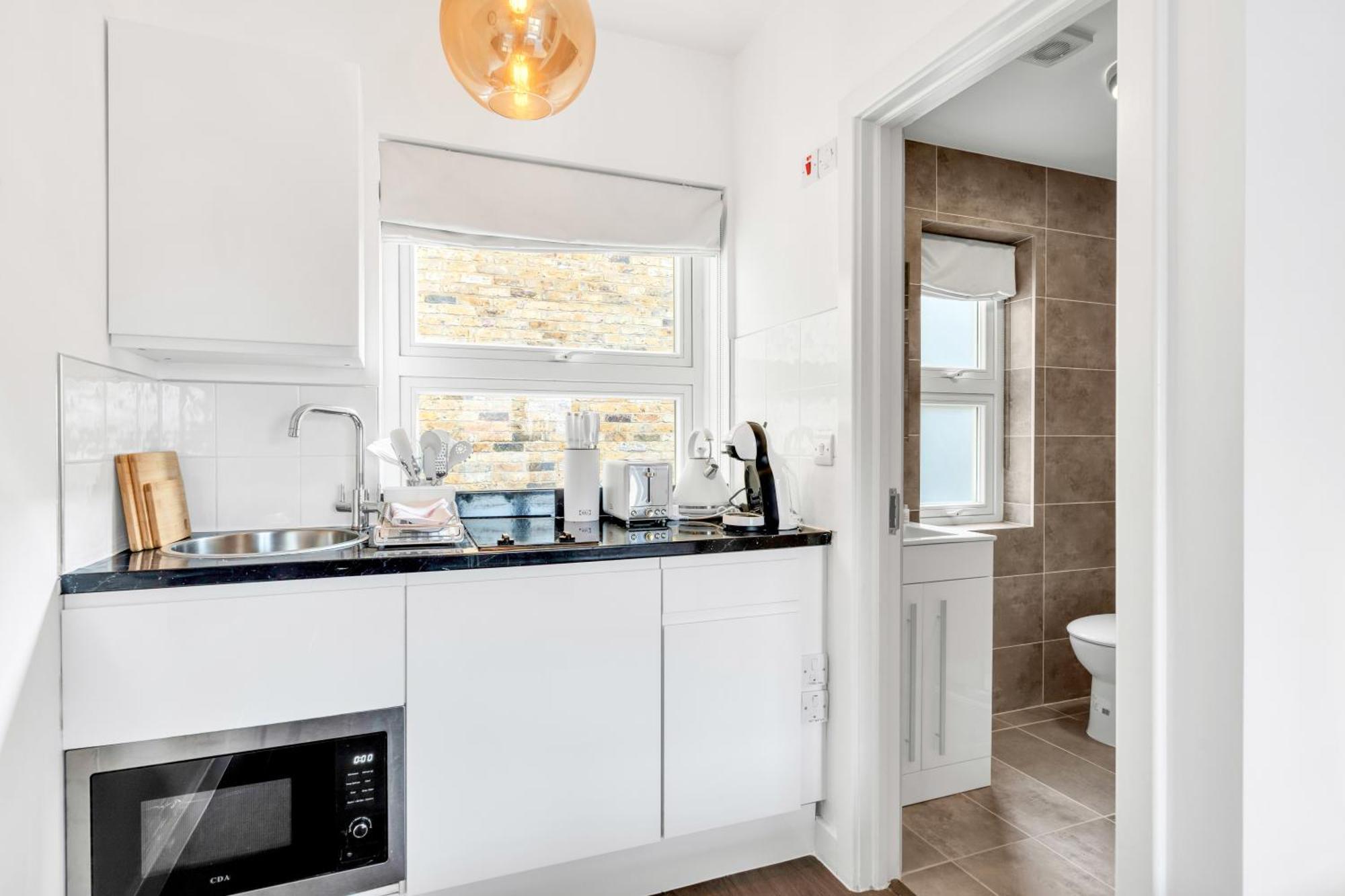 Urban Elegance Luxury Living With Kitchenette Appartement