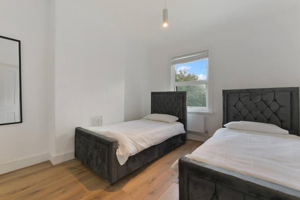 Cosy 3 Bed In Colliers Wood Сasa de vacaciones *