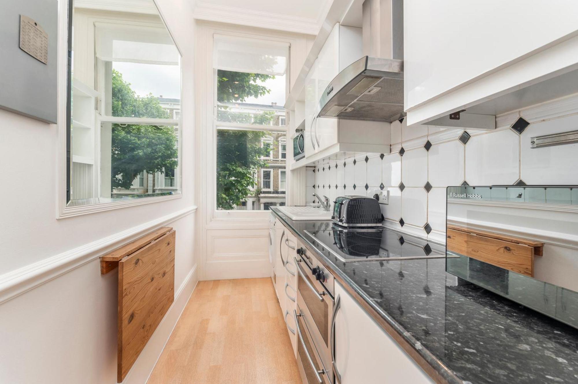 Kensington Luxury Retreat: Spacious 2-bedroom With Prime Location Londres